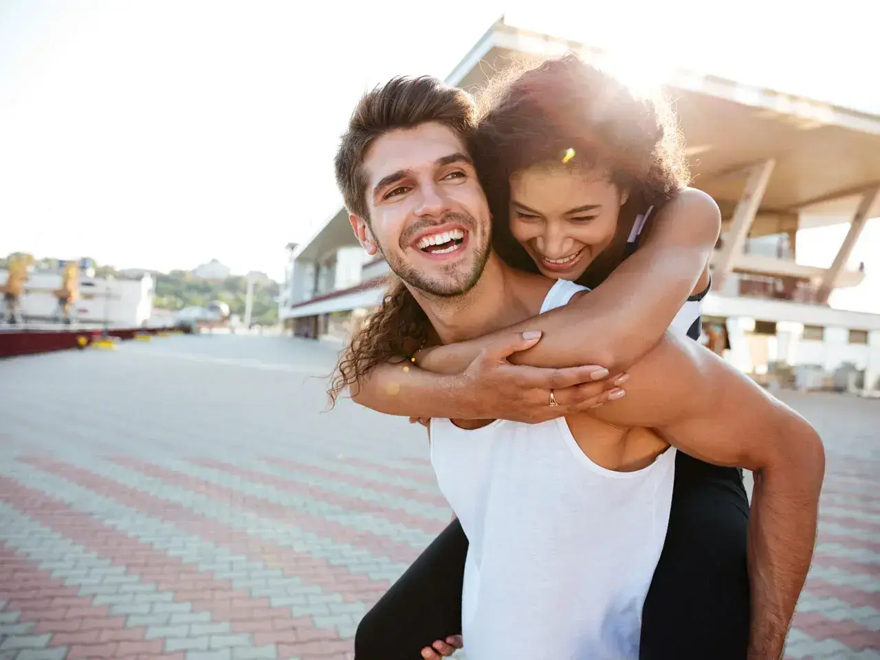 Happy couple connecting through dream conversations